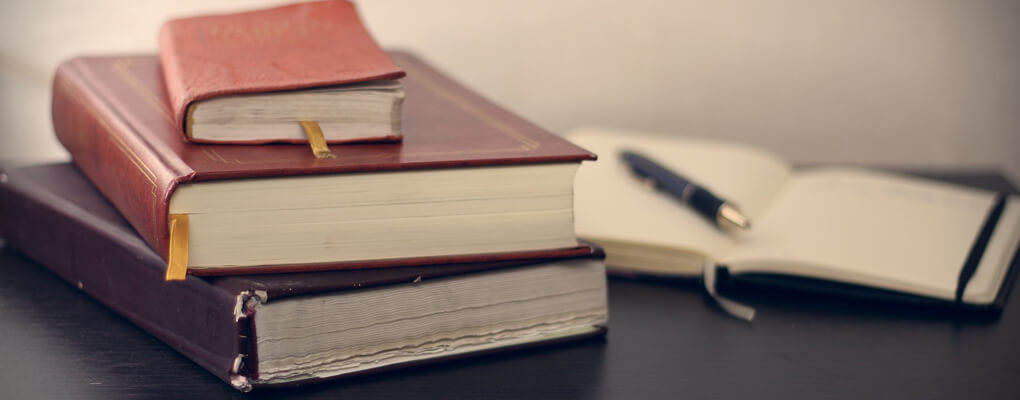 books-and-pen website content creation